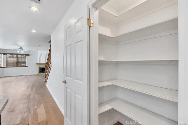 a view of a hallway with a closet