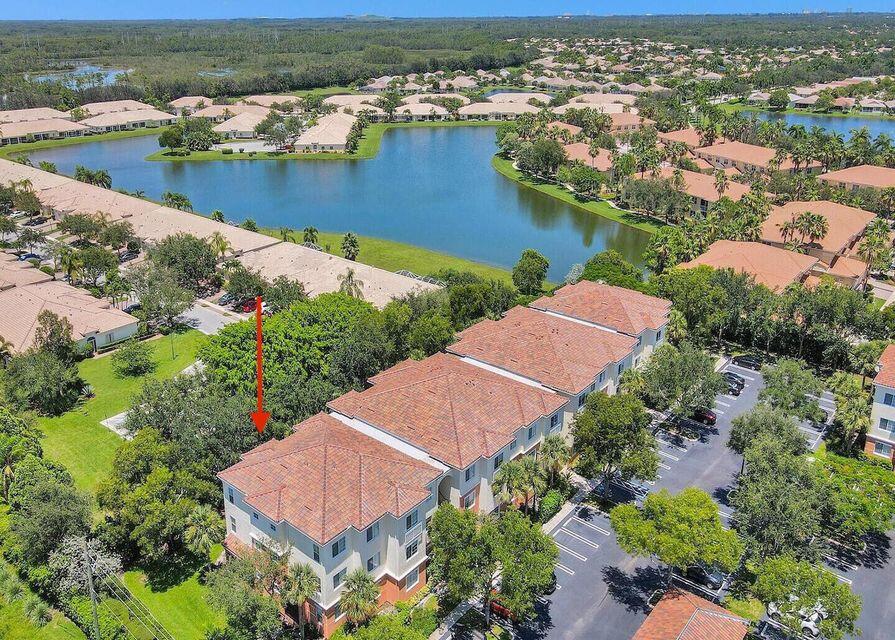 9857 Baywinds Boulevard, Unit 9302 West Palm Beach, FL 33411 - Photo 45 of 45 an aerial view of lake residential house with outdoor space