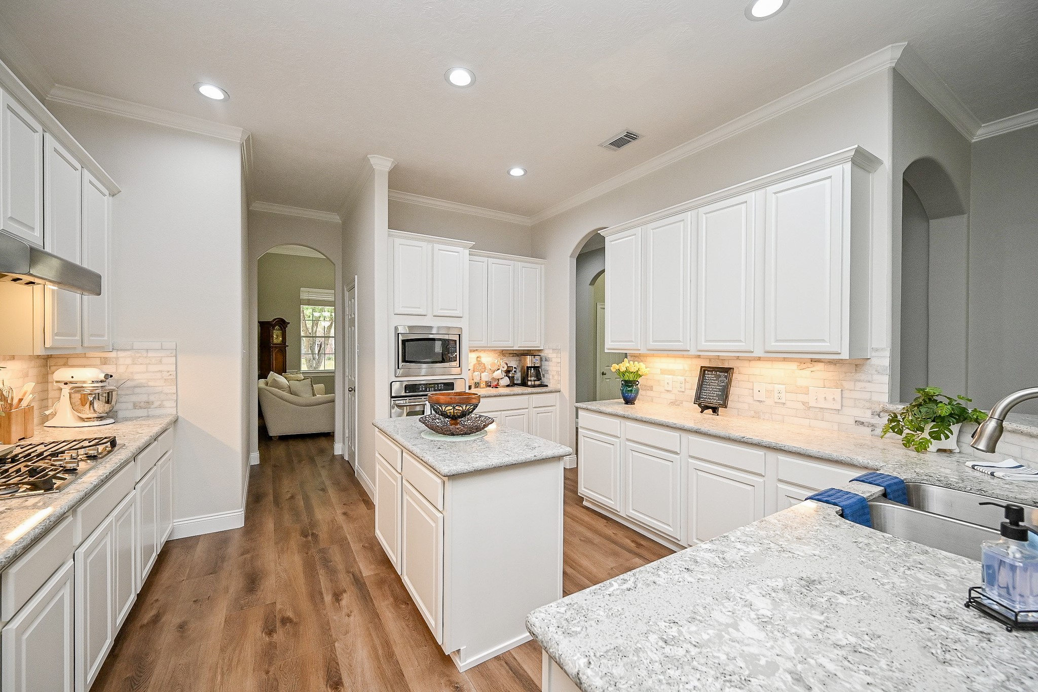 25608 Kransburg Ridge Court Porter, TX 77365 - Photo 11 of 30 Looking through the kitchen to the dining area.