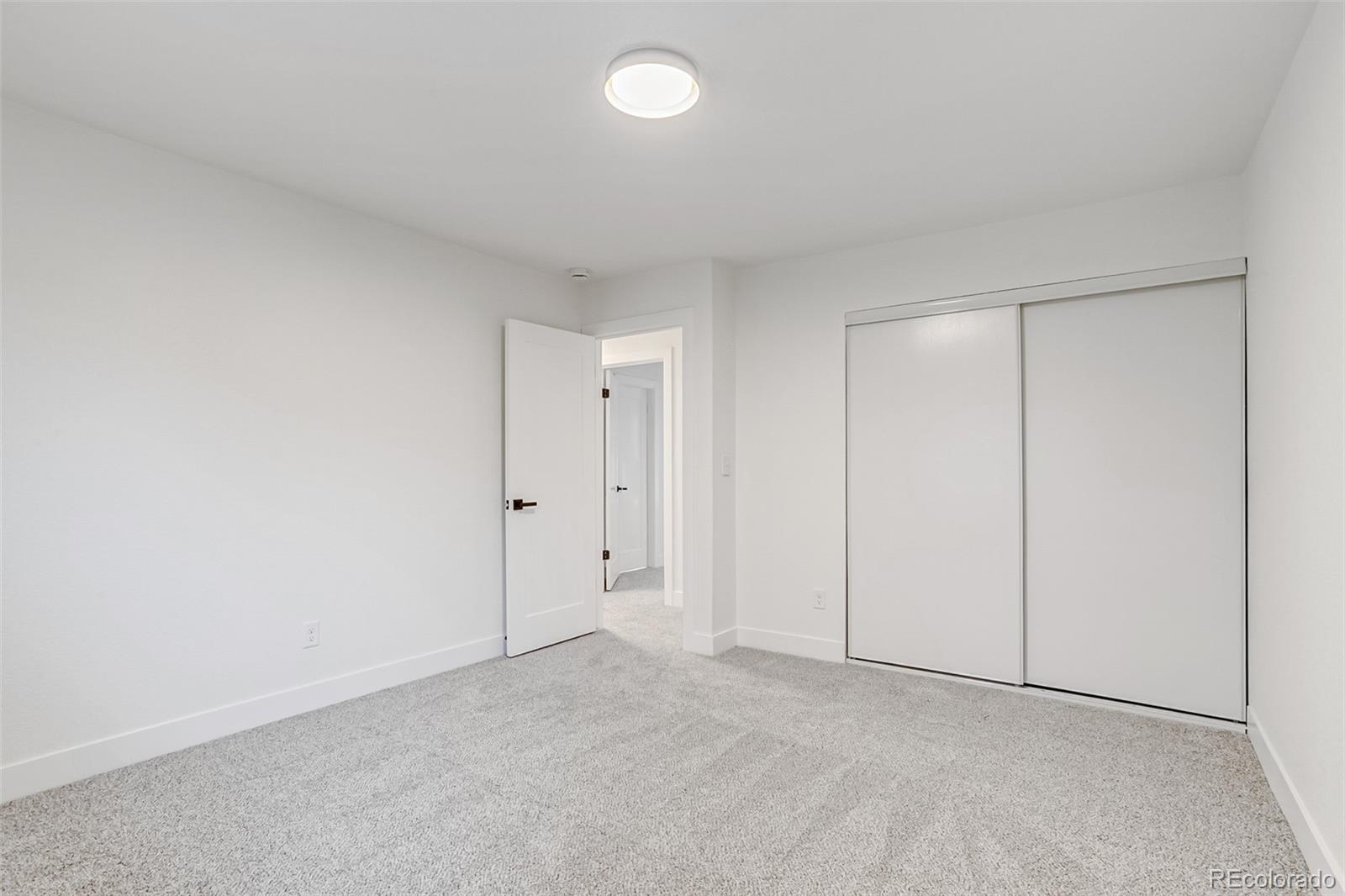 9260 Cody Lane Westminster, CO 80021 - Photo 11 of 18 a view of an empty room