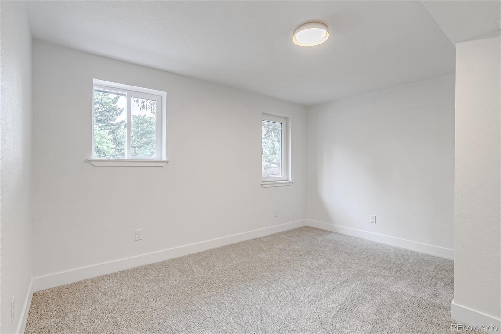 9260 Cody Lane Westminster, CO 80021 - Photo 15 of 18 an empty room with a window