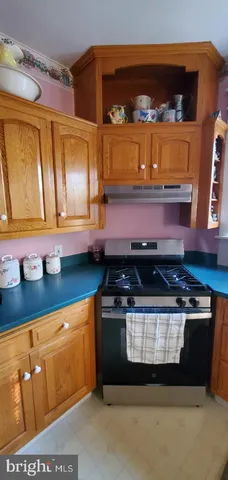 a bathroom with a sink a mirror and bathtub