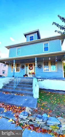 a view of a yard with an ocean view