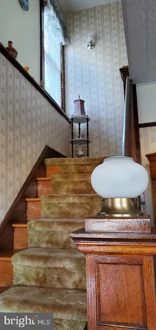 a sink with a stove and a microwave