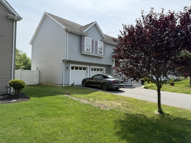 17 Lynwood Street Fall River, MA 02721 - Photo 27 of 28 a view of a house with backyard and sitting area