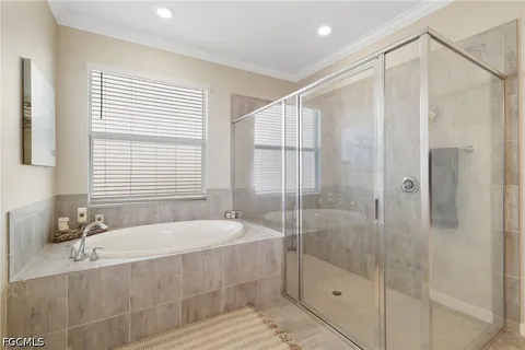 a view of a livingroom with walk in closet and bedroom