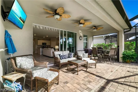 a view of a swimming pool with a patio