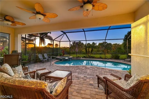 a view of a swimming pool with a patio