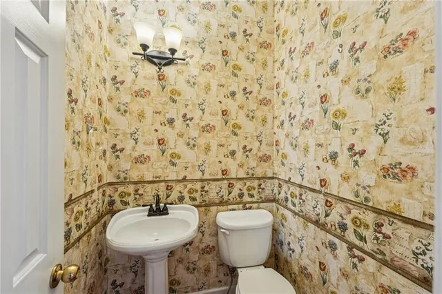 a bathroom with a bathtub a sink a vanity and a shower