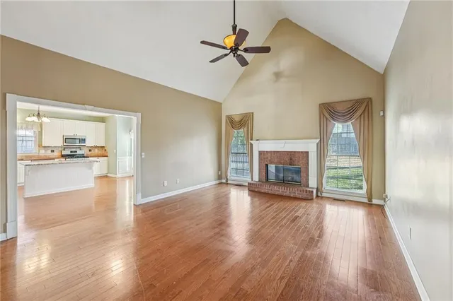 a view of an entryway with wooden floor