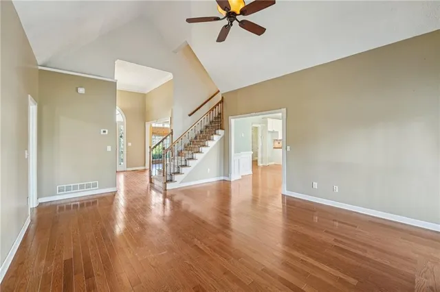 a view of an entryway with wooden floor