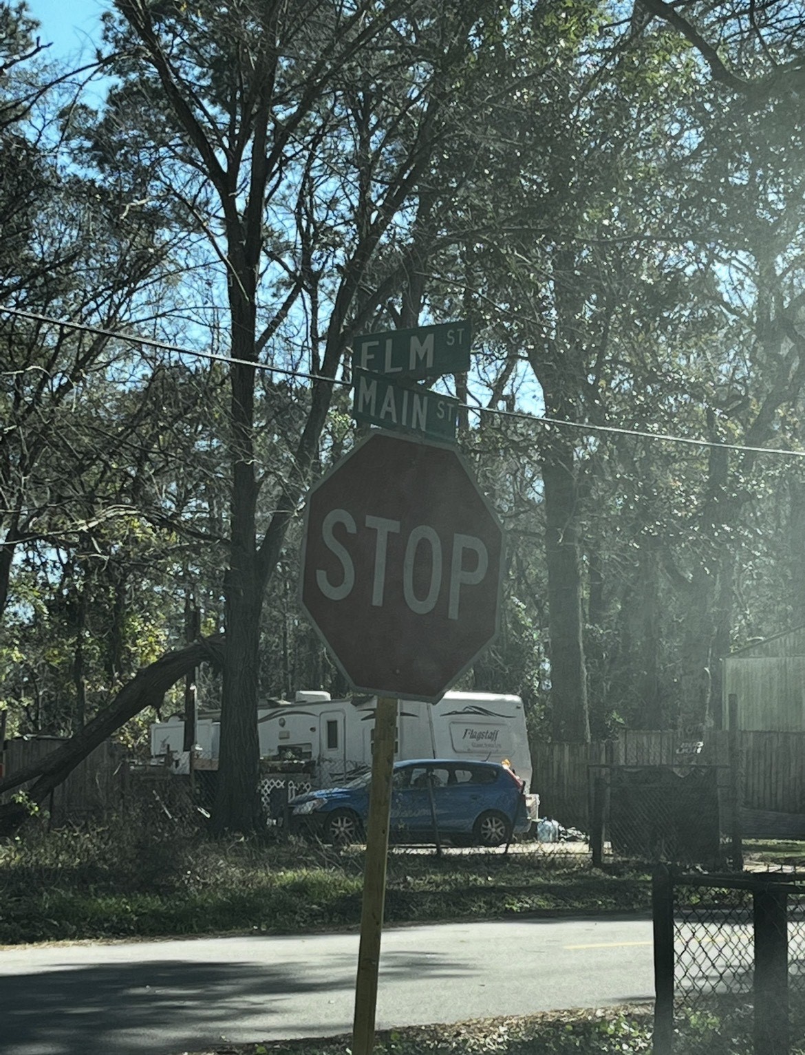 0 Elm Street Huffman, TX 77336 - Photo 4 of 6 a sign broad on the side of the road