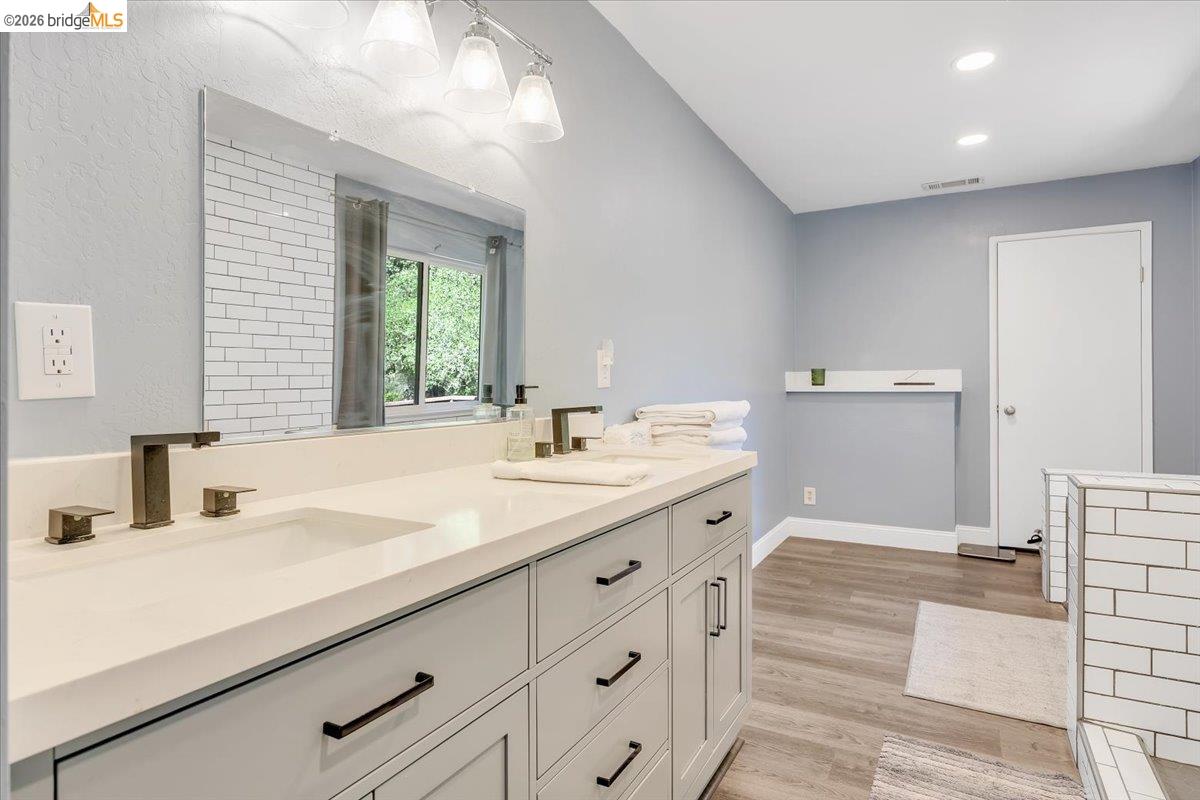 8733 Fraguero Road Sonora, CA 95370 - Photo 44 of 73 Dual vanity with light-toned countertop and integrated sinks
