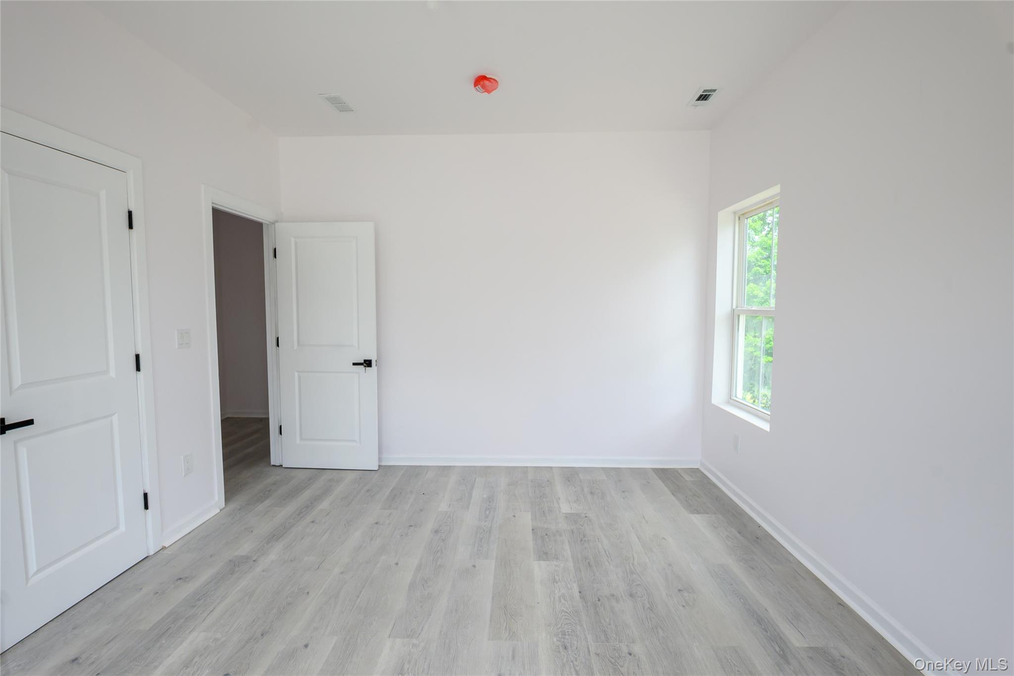 81 Silver Lake Sctn Road Middletown, NY 10940 - Photo 21 of 37 a view of an empty room