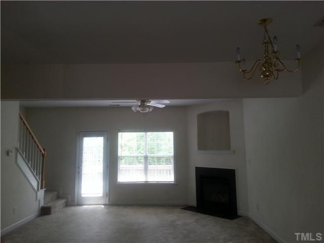 4606 Centrebrook Circle Raleigh, NC 27616 - Photo 3 of 6 a view of an empty room with a window