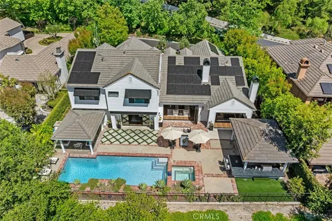 an aerial view of a house with garden