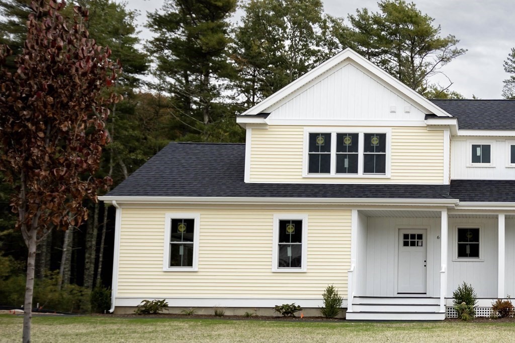 6 Katlyn Circle Rochester, MA 02770 - Photo 1 of 37 a view of a white house with a small yard plants and large tree