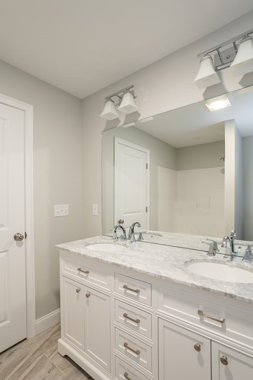 6 Katlyn Circle Rochester, MA 02770 - Photo 15 of 37 a bathroom with a sink and a mirror