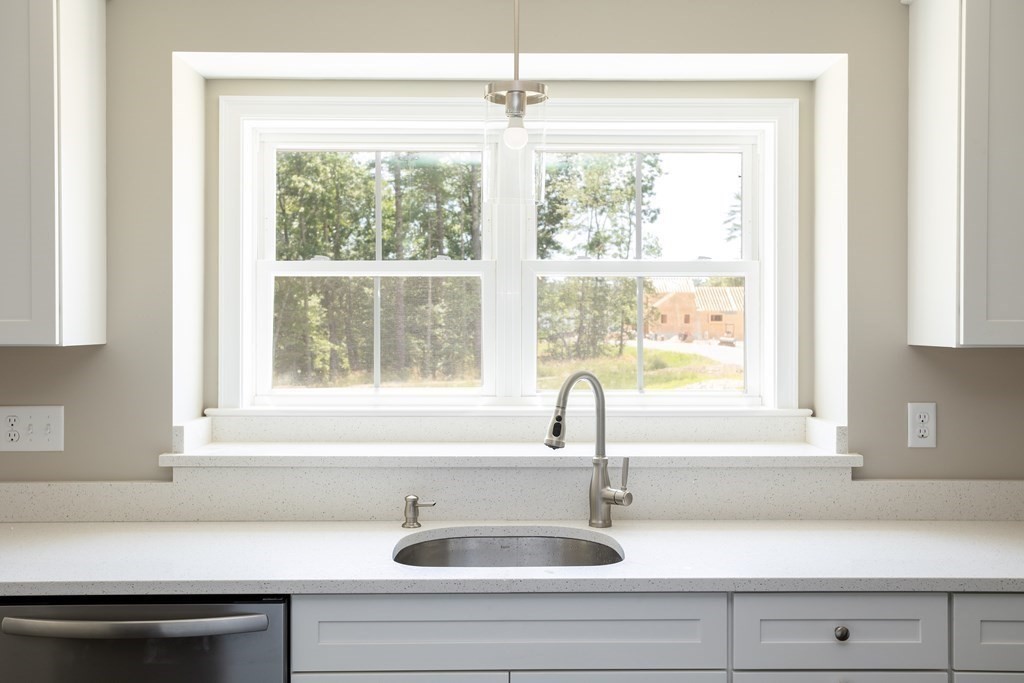 6 Katlyn Circle Rochester, MA 02770 - Photo 5 of 37 a kitchen with a sink and a window