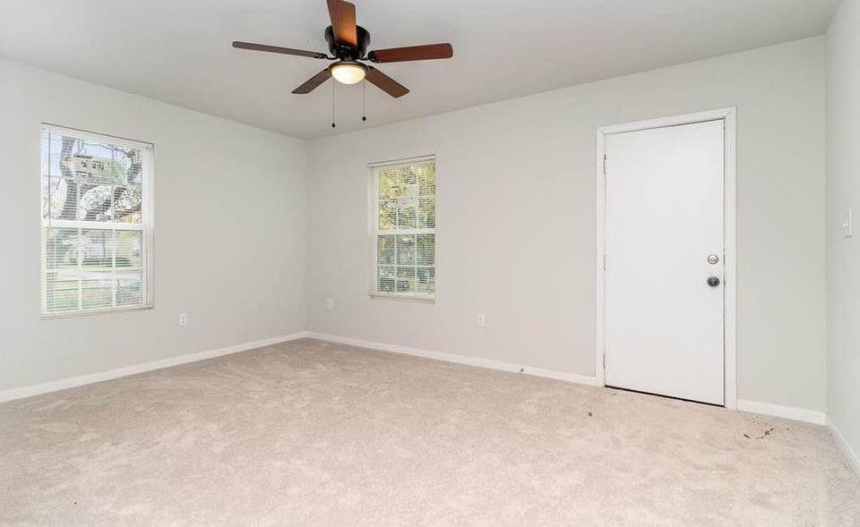 2003 West Bond Street Denison, TX 75020 - Photo 13 of 16 a view of an empty room with a window