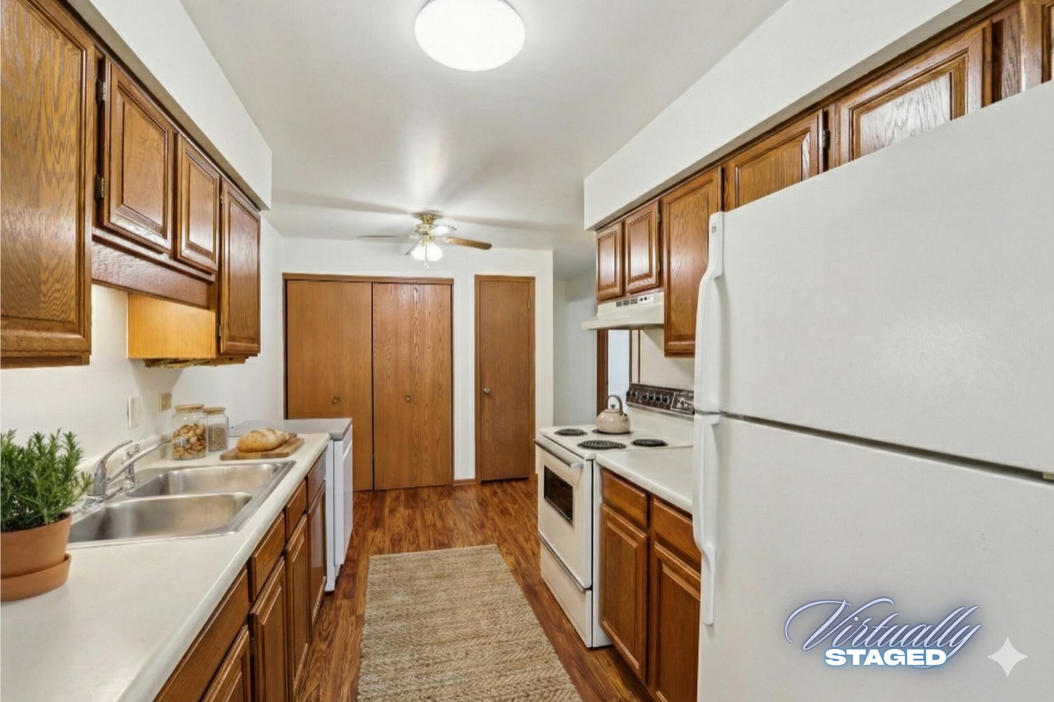 4417 South Green Ridge Circle, Unit G Greenfield, WI 53220 - Photo 10 of 34 Kitchen - Virtually Staged