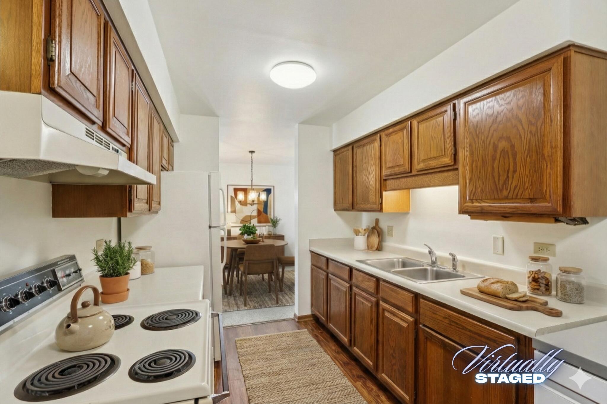 4417 South Green Ridge Circle, Unit G Greenfield, WI 53220 - Photo 12 of 34 Kitchen - Virtually Staged