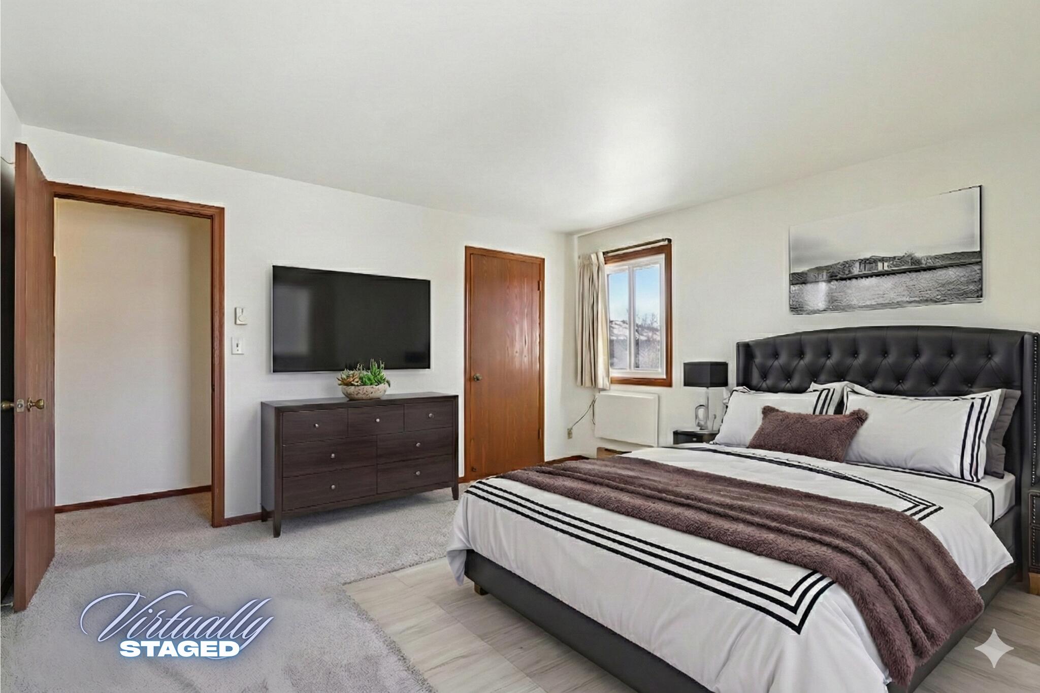 4417 South Green Ridge Circle, Unit G Greenfield, WI 53220 - Photo 18 of 34 Bedroom 1 - VIRTUALLY STAGED