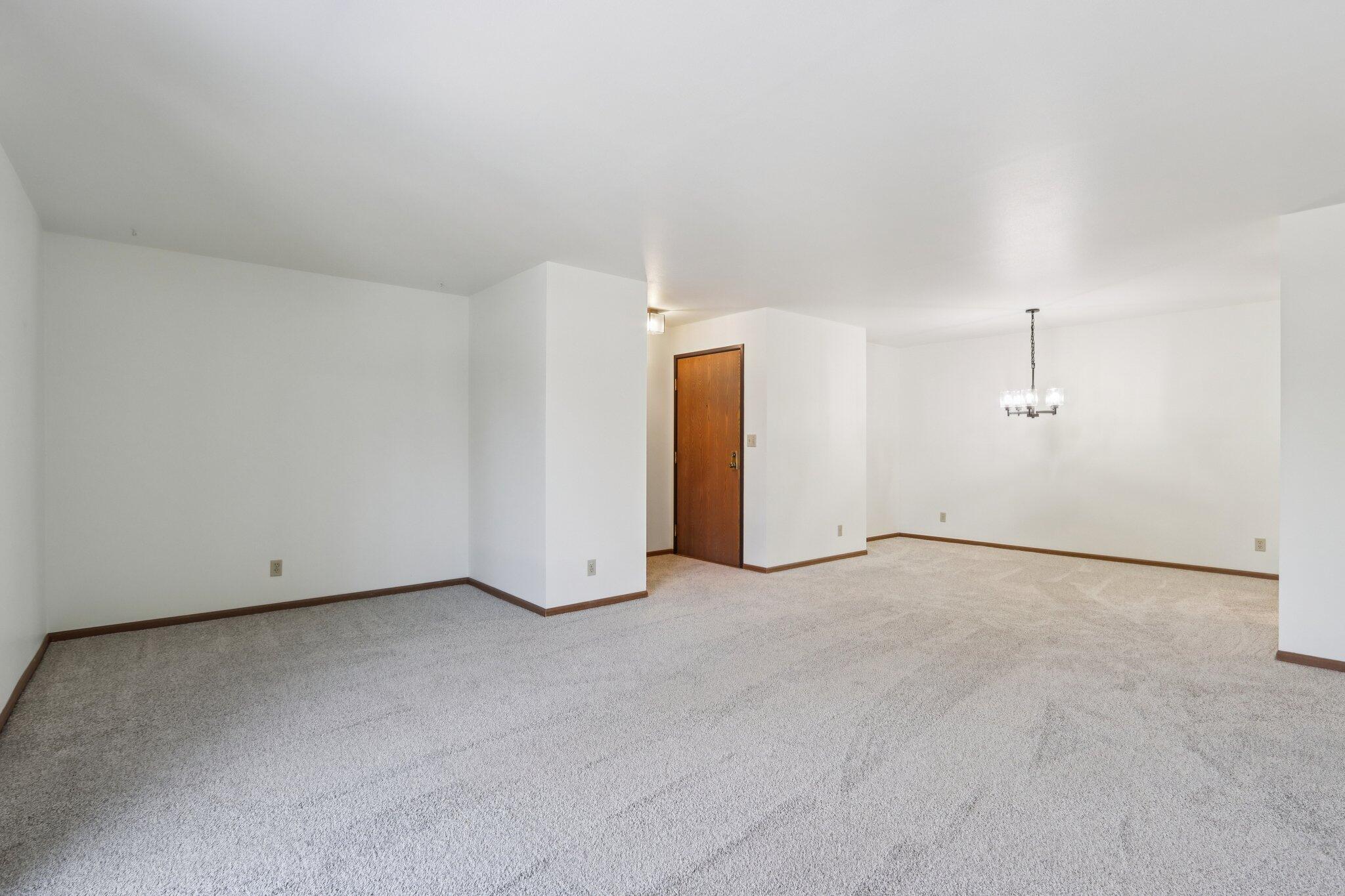 4417 South Green Ridge Circle, Unit G Greenfield, WI 53220 - Photo 9 of 34 Living to Dining Space