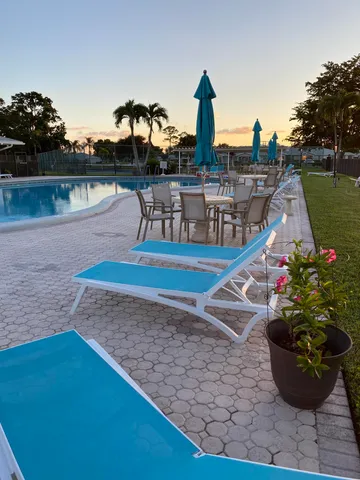 a view of a lake with a sitting space