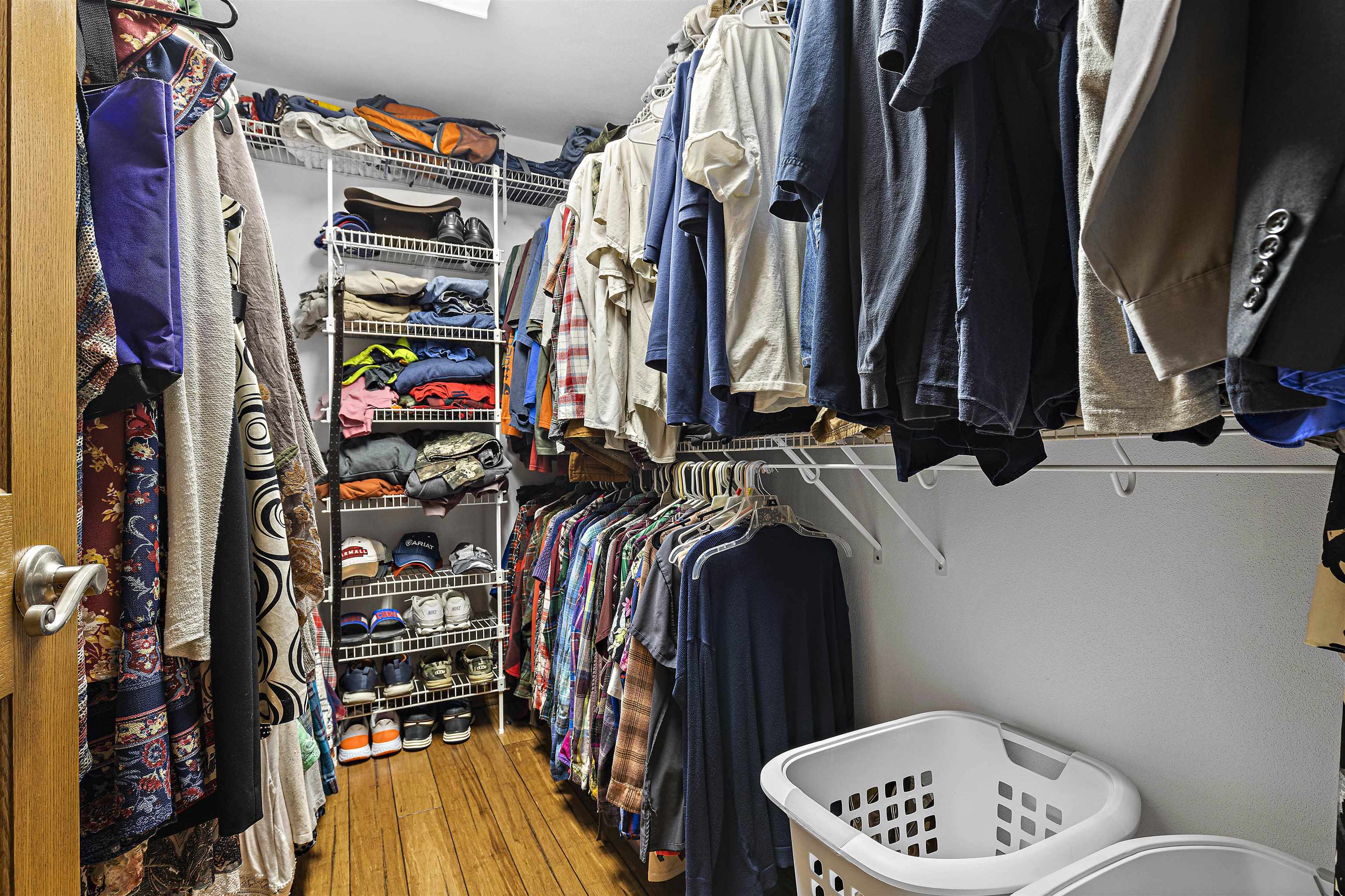 5611 Gray Eagle Road Roscoe, IL 61073 - Photo 26 of 43 a view of walk in closet with clothes and shoes