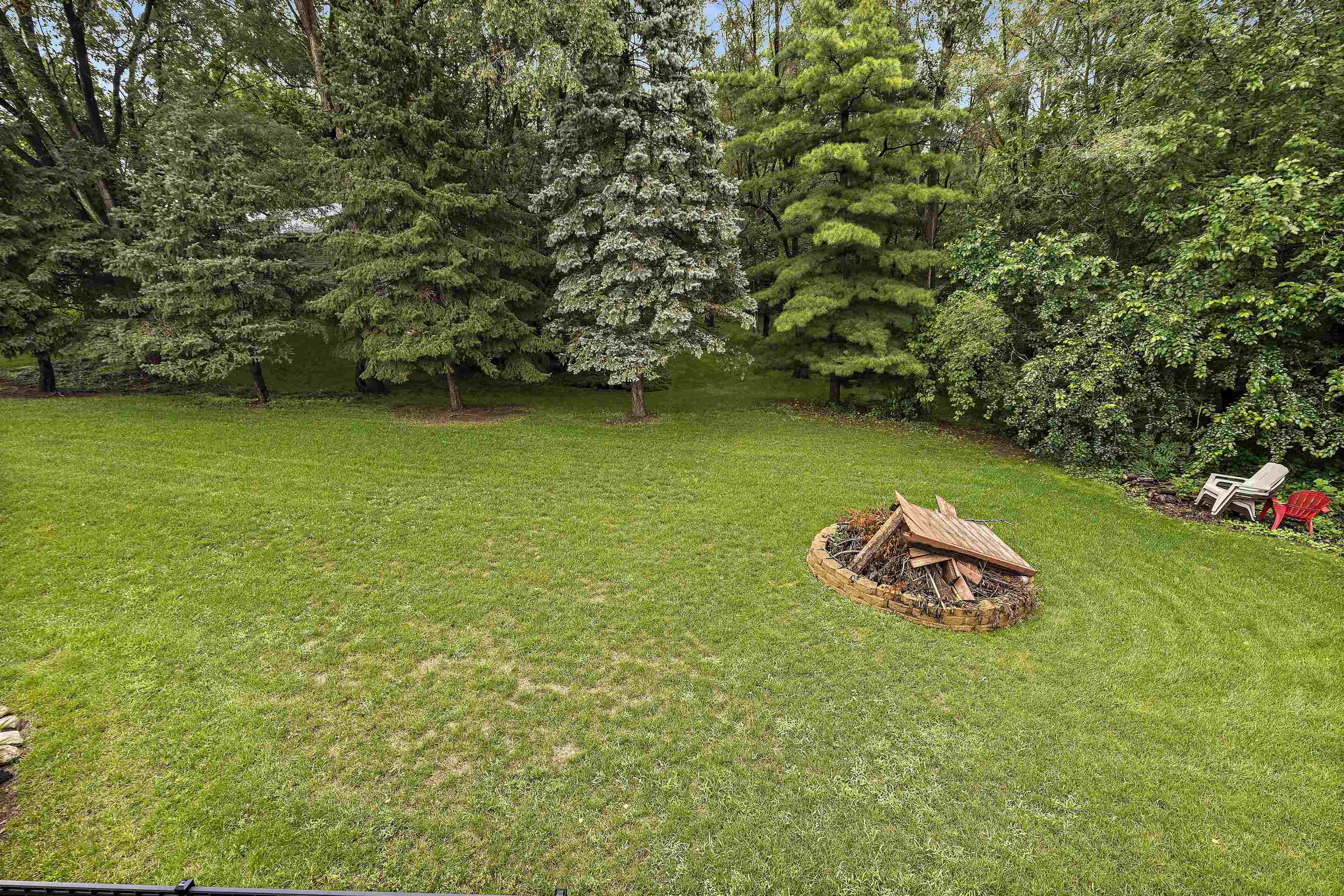 5611 Gray Eagle Road Roscoe, IL 61073 - Photo 43 of 43 a picture of a tree with a garden