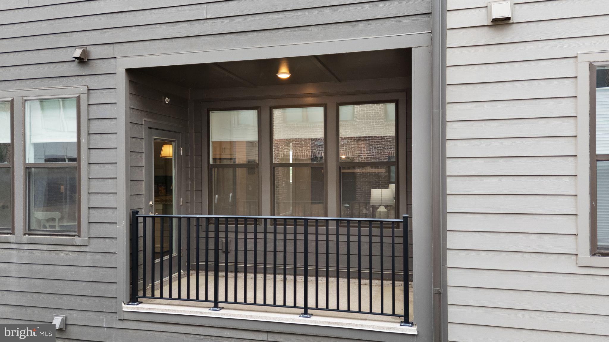 1867 Michael Faraday Drive, Unit 4 Reston, VA 20190 - Photo 25 of 53 a view of a balcony