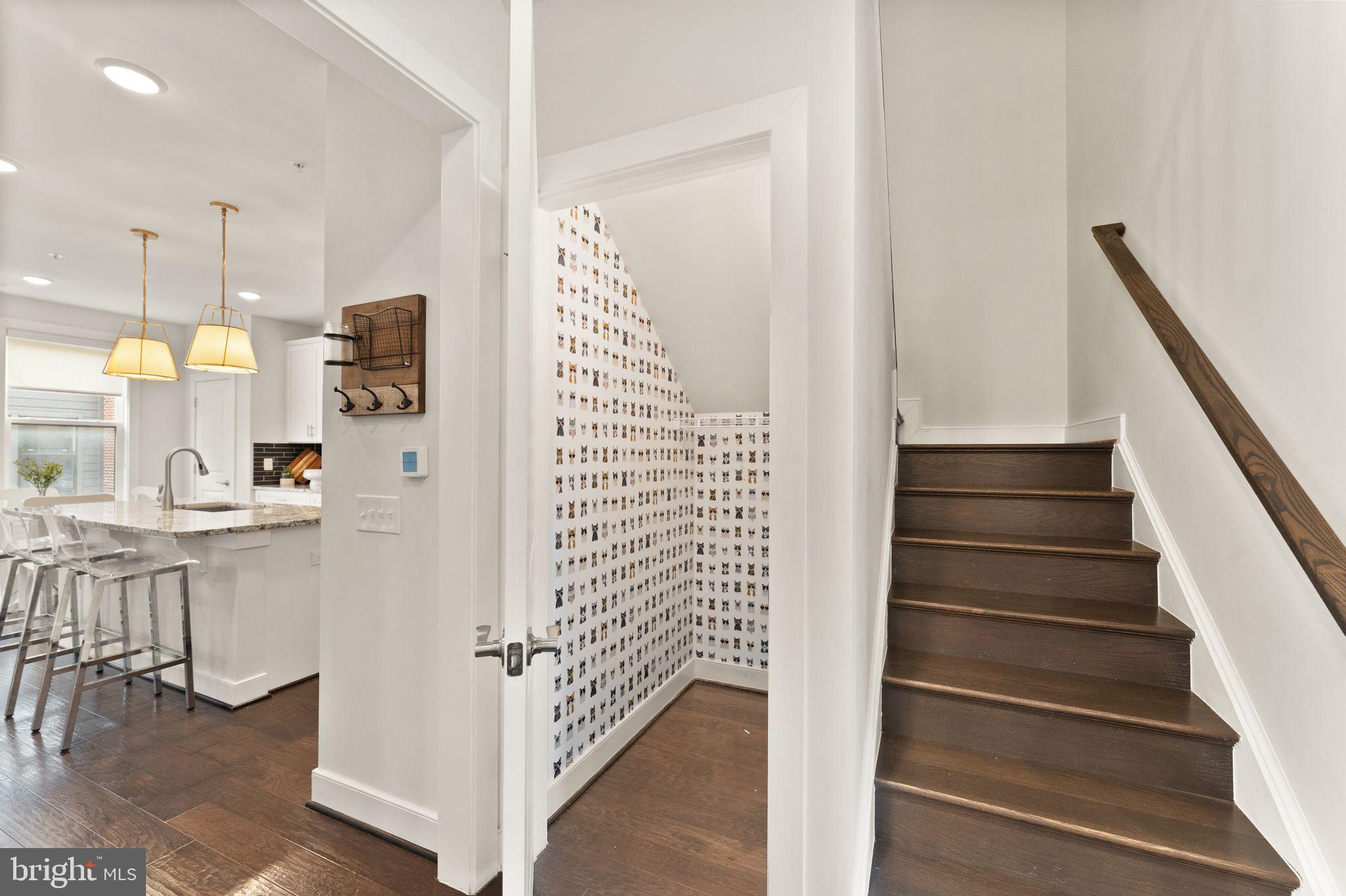 1867 Michael Faraday Drive, Unit 4 Reston, VA 20190 - Photo 27 of 53 a view of entryway and hall with wooden floor
