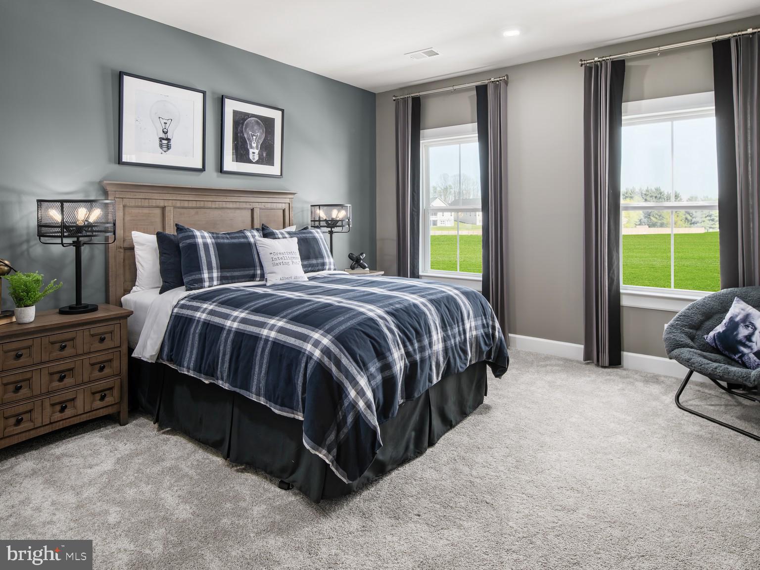 1221 Bear Branch Road Laurel, MD 20708 - Photo 17 of 22 a bedroom with a bed and a couch