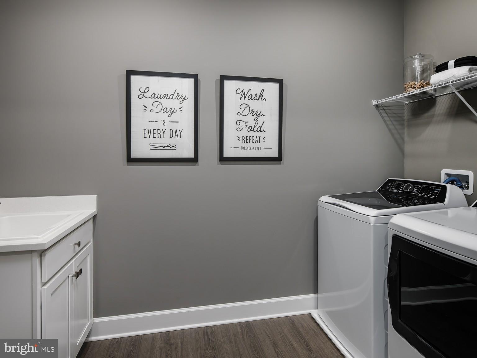 1221 Bear Branch Road Laurel, MD 20708 - Photo 19 of 22 a view of storage and utility room with washer and dryer