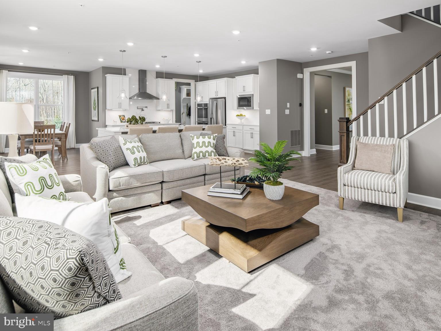 1221 Bear Branch Road Laurel, MD 20708 - Photo 6 of 22 a living room with furniture potted plant and kitchen view