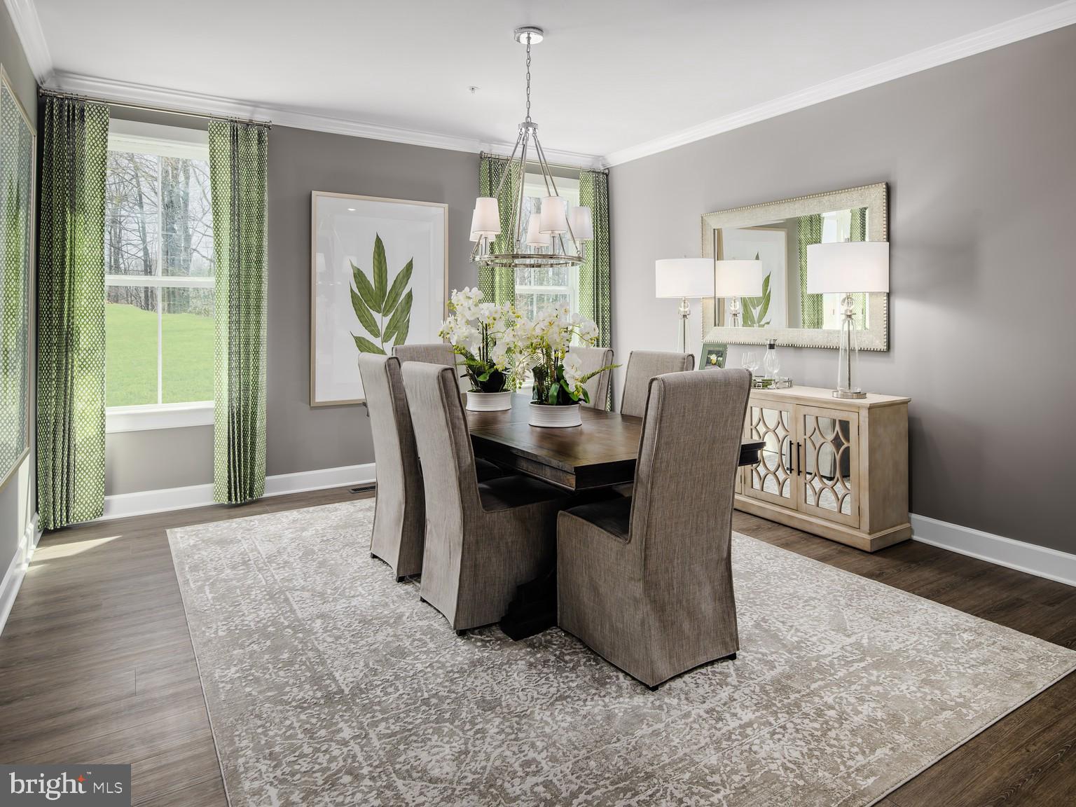 1221 Bear Branch Road Laurel, MD 20708 - Photo 8 of 22 a dining room with furniture a chandelier and wooden floor