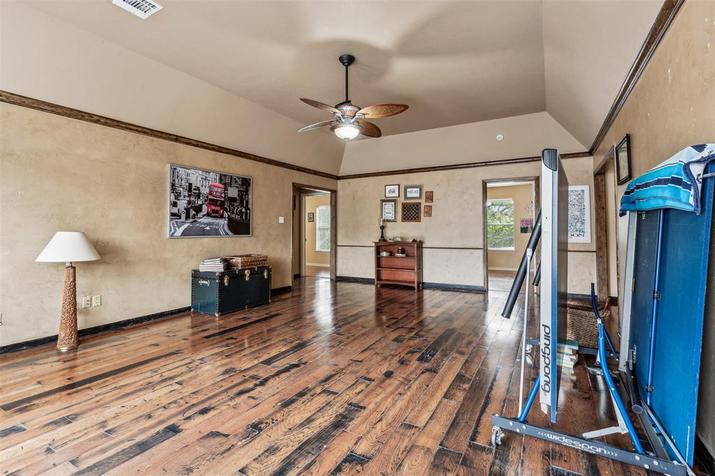 5109 Dewdrop Lane Fort Worth, TX 76123 - Photo 31 of 40 a living room with furniture and a wooden floor