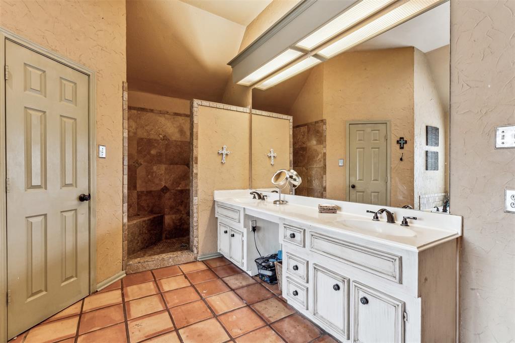 5109 Dewdrop Lane Fort Worth, TX 76123 - Photo 38 of 40 a spacious bathroom with a double vanity sink mirror and
