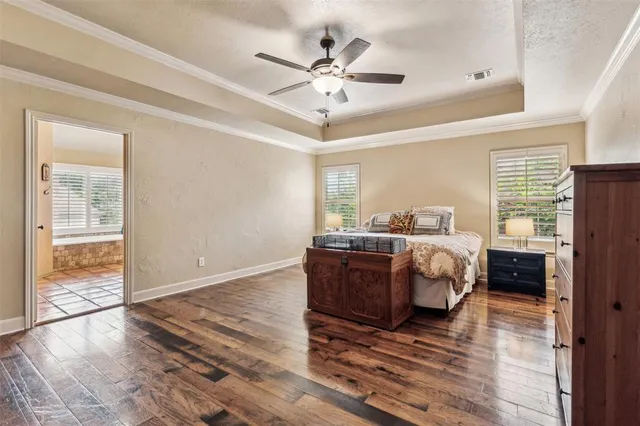 a bed room with bed and window