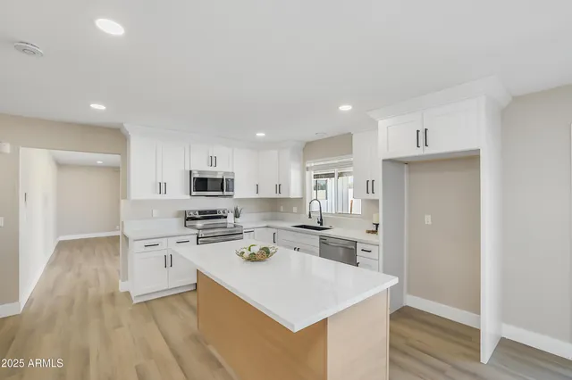 a view of empty room with windows