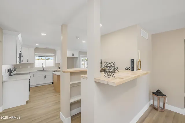 a view of kitchen and sink
