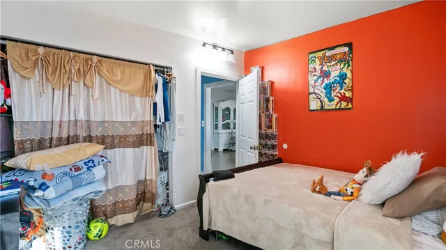 a bathroom with a toilet sink and shower