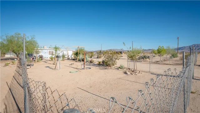 a view of beach and mountain
