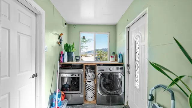 a view of living room washer and dryer