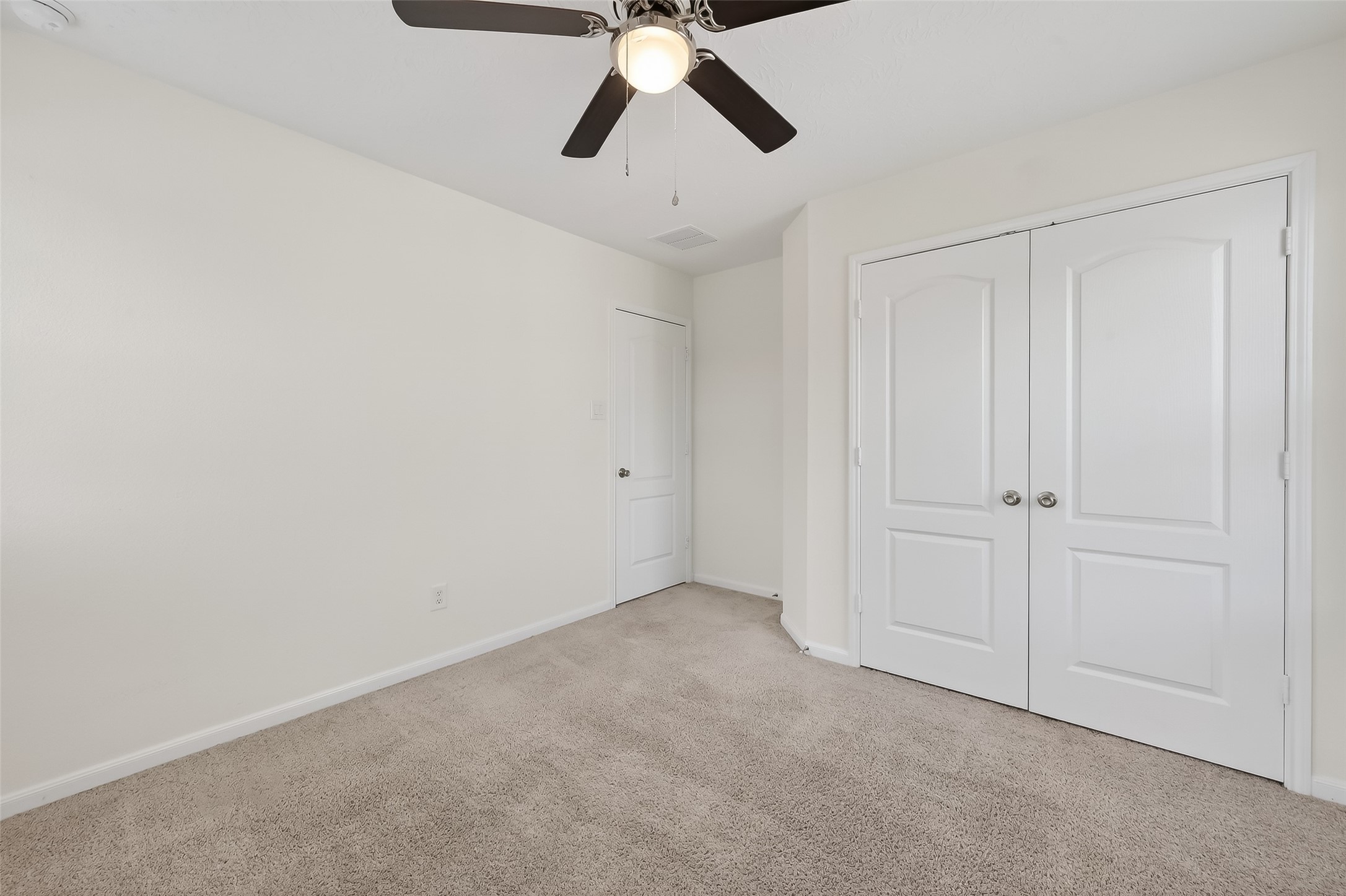 2107 Parnevik Place Conroe, TX 77304 - Photo 29 of 44 Creating a sense of openness