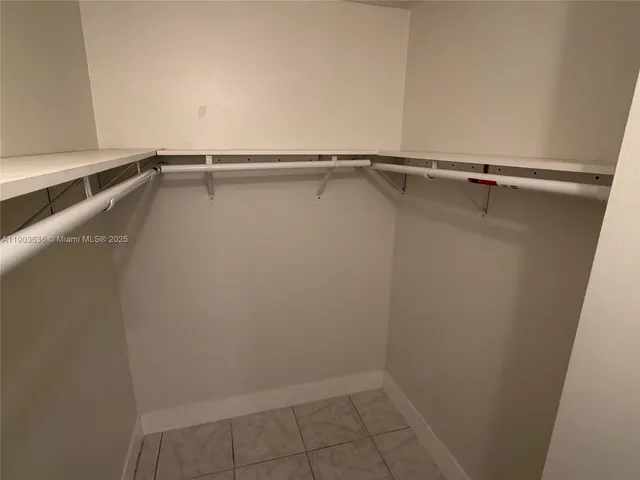 a view of a room with racks on the wall