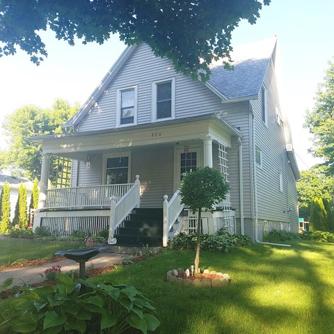 820 North 10th Street Rochelle, IL 61068 - Photo 1 of 2 a front view of a house with a yard
