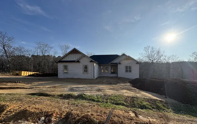 a view of wooden floor with a floor to ceiling window