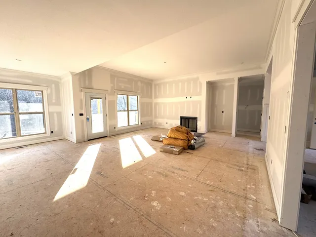 a view of livingroom with furniture and windows